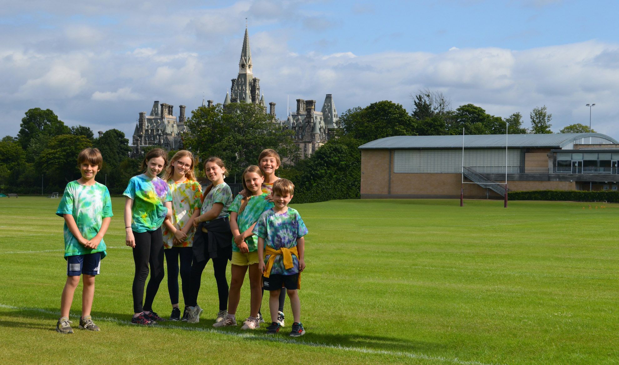 A group of children on the sports pitched during the Fettes Active multi-activity camp at westwoods health club and fettes college